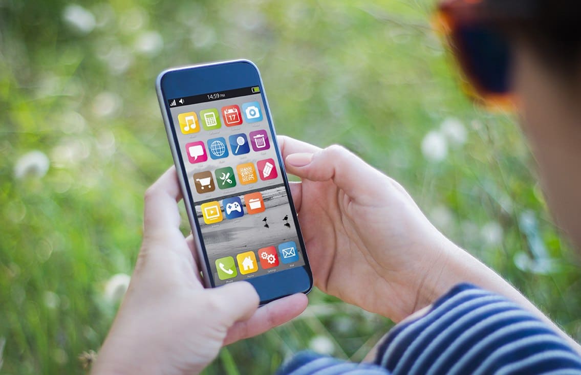 girl using apps on her smartphone