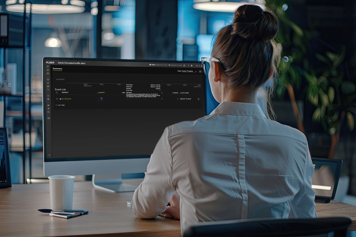 Lady with glasses. Manager is sitting at the computer. Businesswoman works in her office.